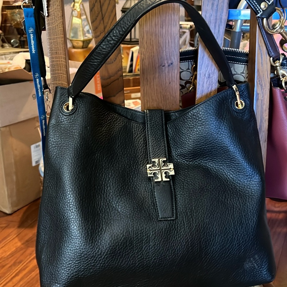 Tory Burch black leather shoulder bag.